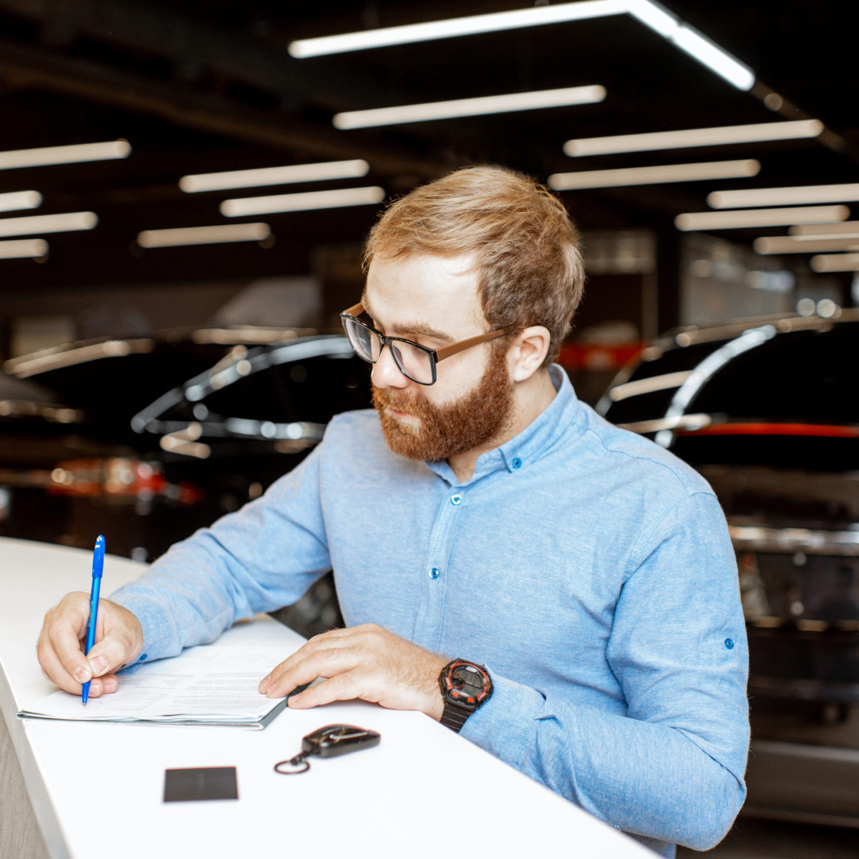 Man Signing Auto lease